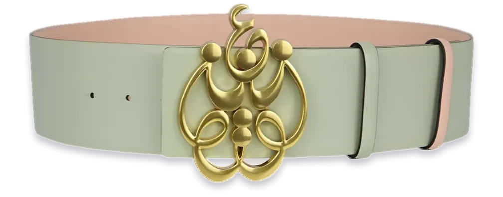 Ishq reversible leather belt in sage with a blush reverse; the gold buckle is the Arabic word Ishq, love, drawn as a flower